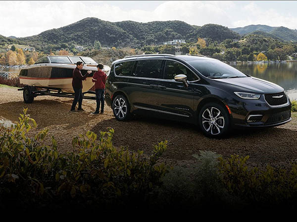 2026 Chrysler Pacifica towing a boat