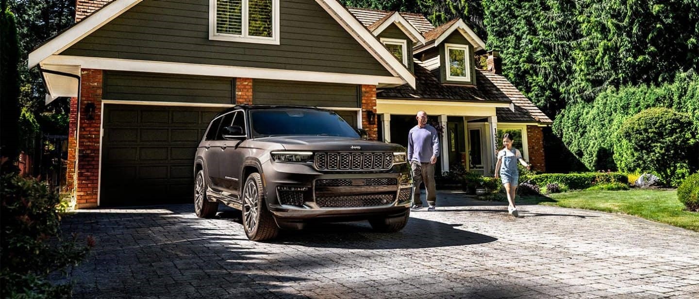 Jeep Grand Cherokee parked in a driveway