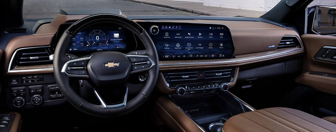 The brown interior of a 2025 Chevy Suburban.