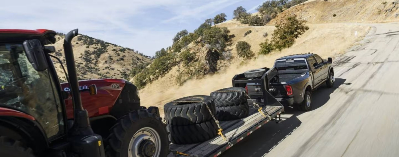 A grey 2025 Ram 3500 from the rear.