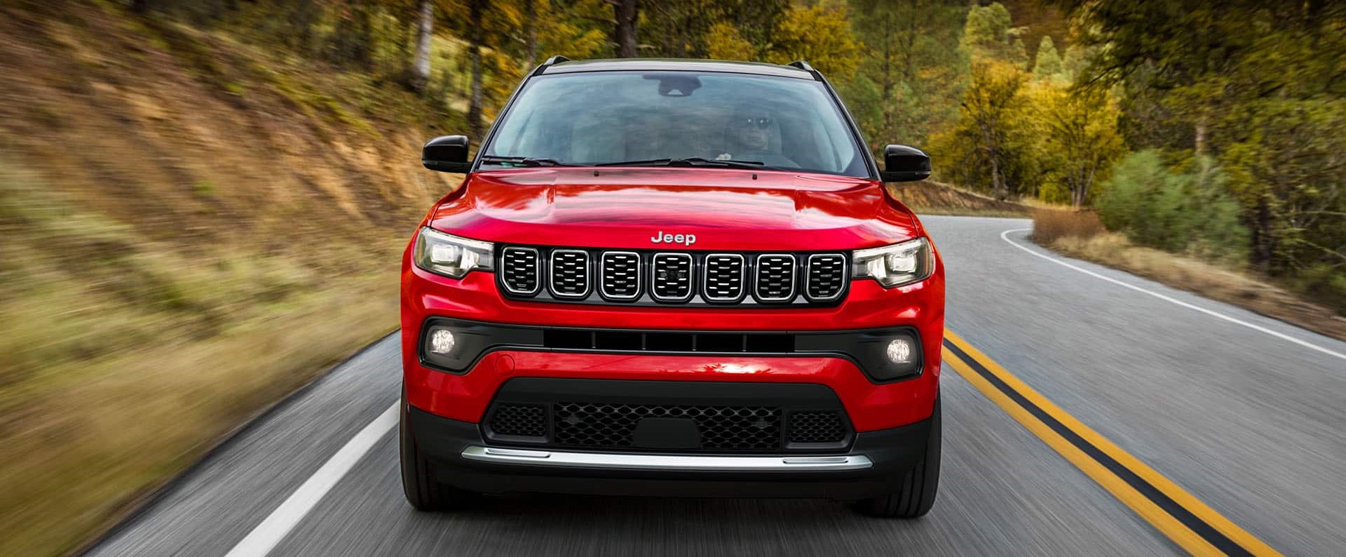 Front view of a red 2026 Jeep Compass