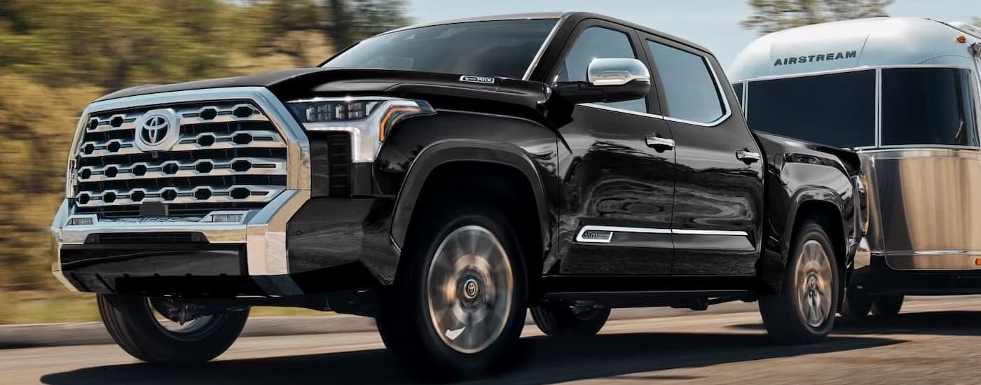Black 2026 Toyota Tundra towing an Airstream camper trailer