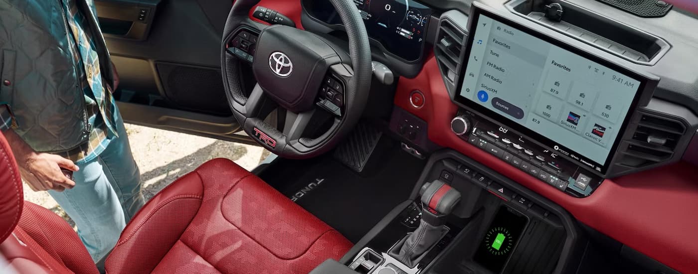 Red and black leather interior of a 2025 Toyota Tundra