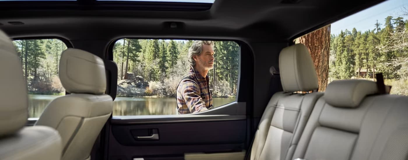 Man walking past a 2026 Toyota Tundra