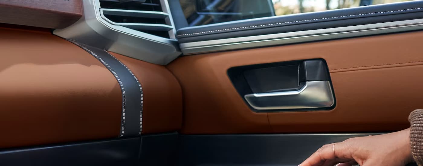 Brown leather dashboard and door in a 2026 Toyota Tundra