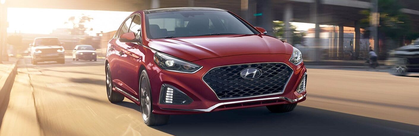 front view of a red 2019 Hyundai Sonata Hybrid