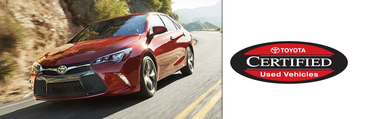 Red Toyota Camry drives up a highway. Logo on the right says, "Toyota CERTIFIED Used Vehicles."