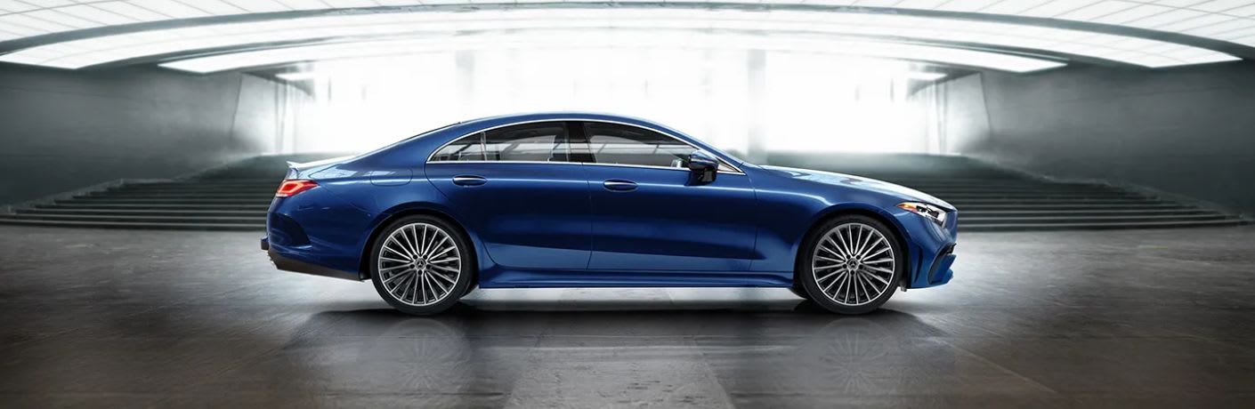 Side view of the 2023 Mercedes-Benz CLS 450 4MATIC® Sedan in Starling Blue
