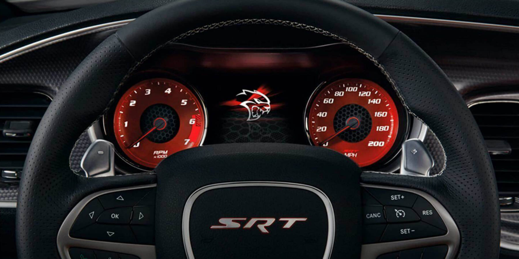 Dodge Charger Tyler, TX - red interior of a Dodge Charger