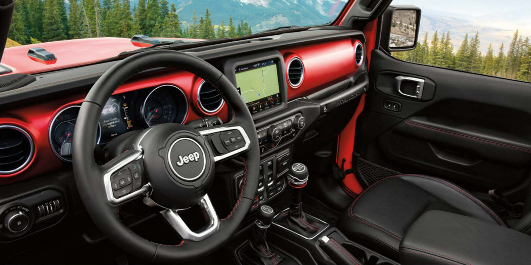 Jeep Wrangler Texarkana, TX - interior view of red Jeep Wrangler