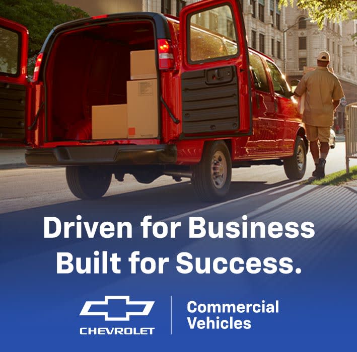 Red Van with text reading driven for business built for success and Chevrolet commercial vehicle logo