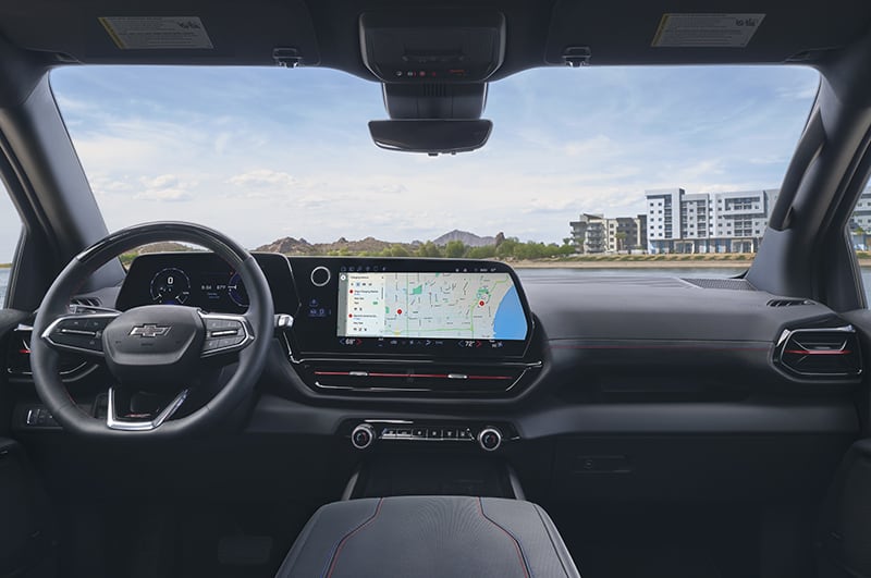 View of driver seat, steering wheel and dashboard in the 2024 Silverado EV