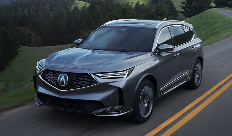 Front exterior of 2026 Acura MDX on road