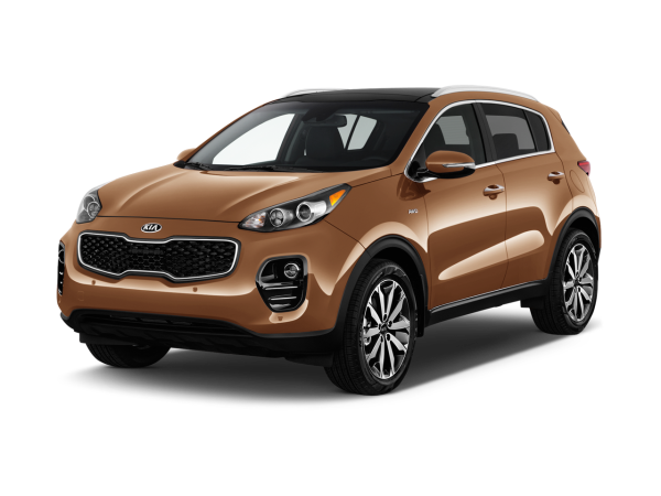 A red Kia Sportage parked on the side of the road.