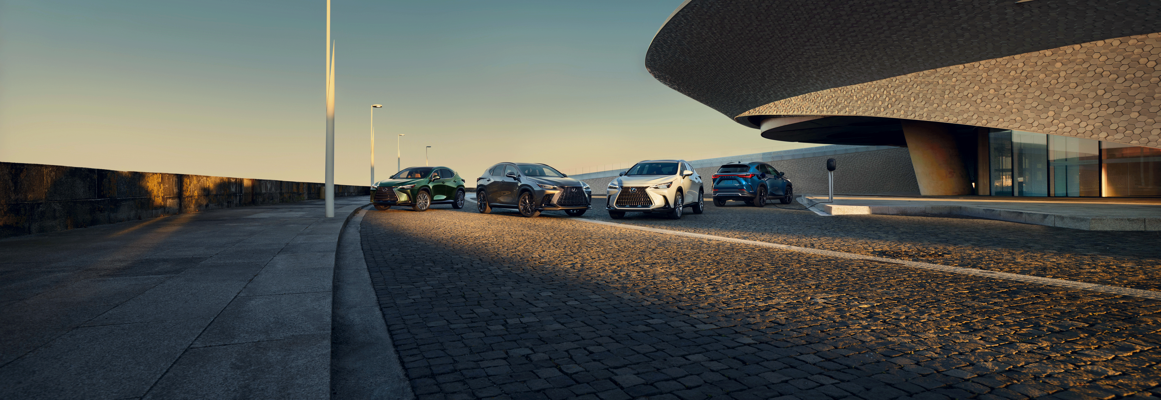 Multiple Lexus NX models shown, including the NX, NX F SPORT HANDLING, and NX Plug-in Hybrid Electric Vehicle.