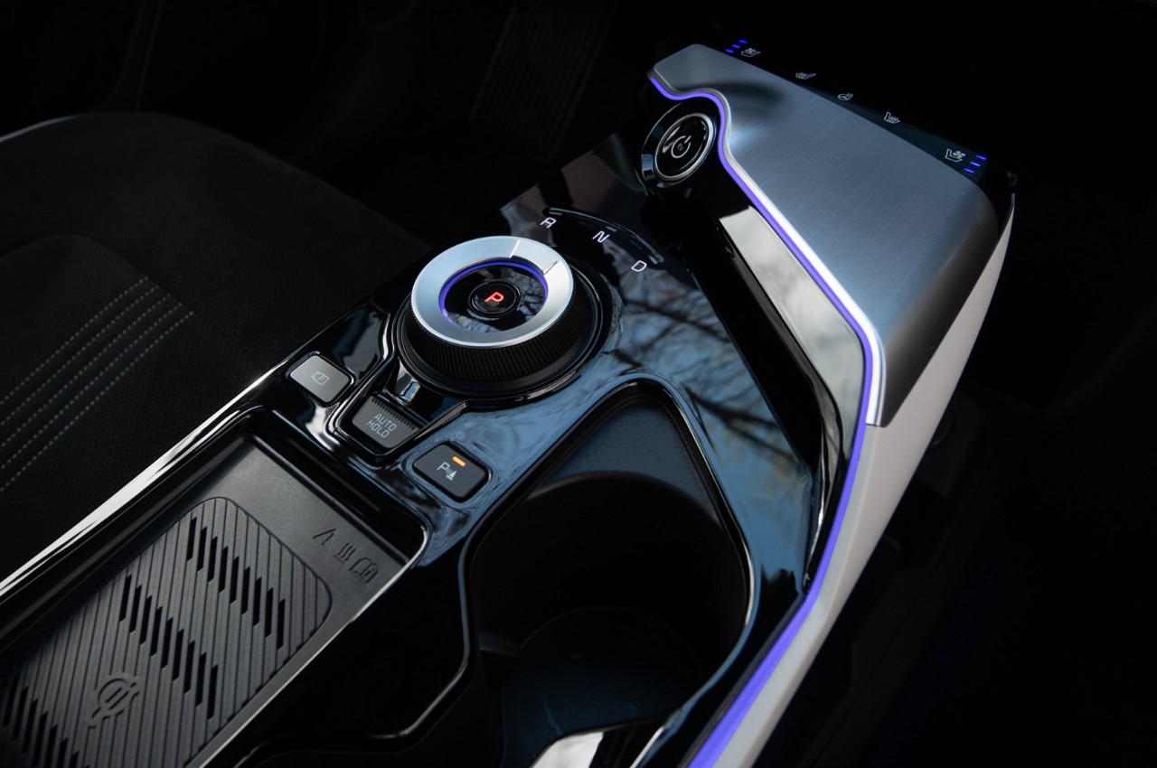 Center console with gear-shifter and cupholder