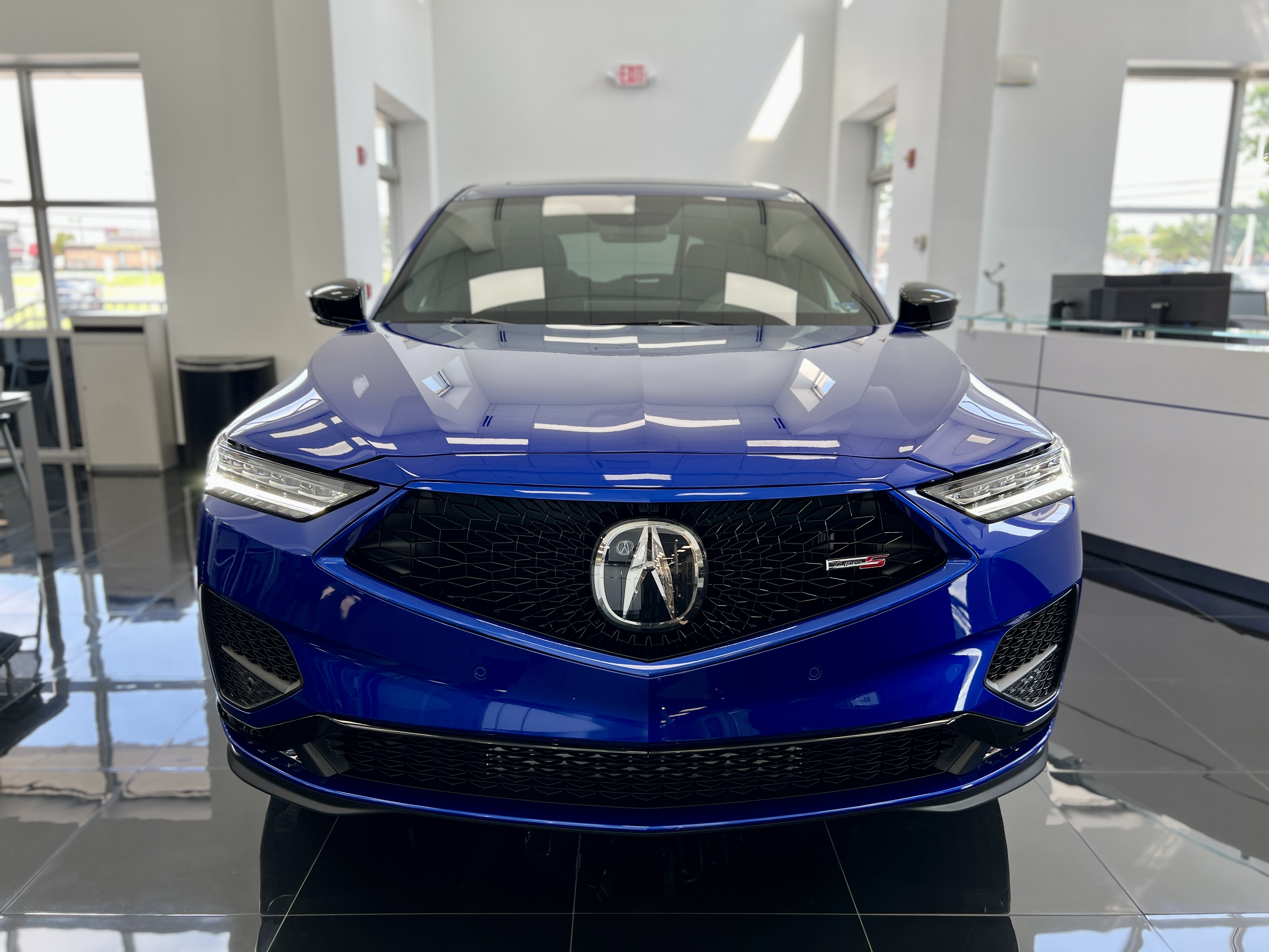 Front view of blue Acura MDX