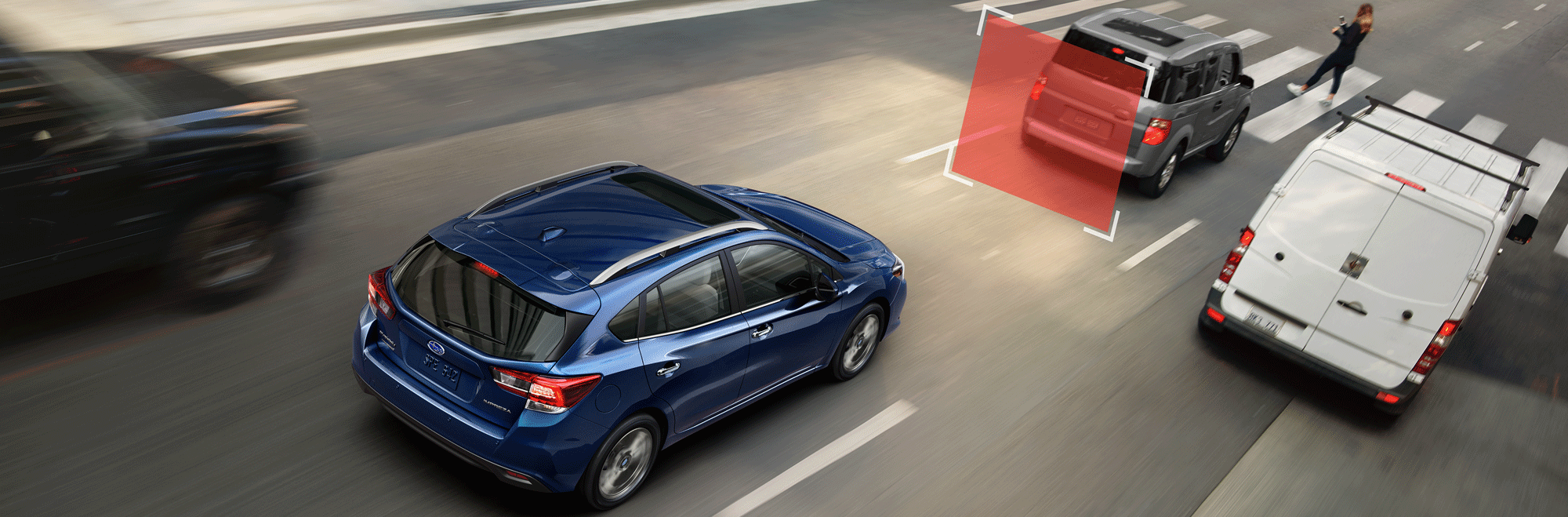 A photo illustration showing Automatic Pre-Collision Braking feature of the 2023 Impreza hatchback.