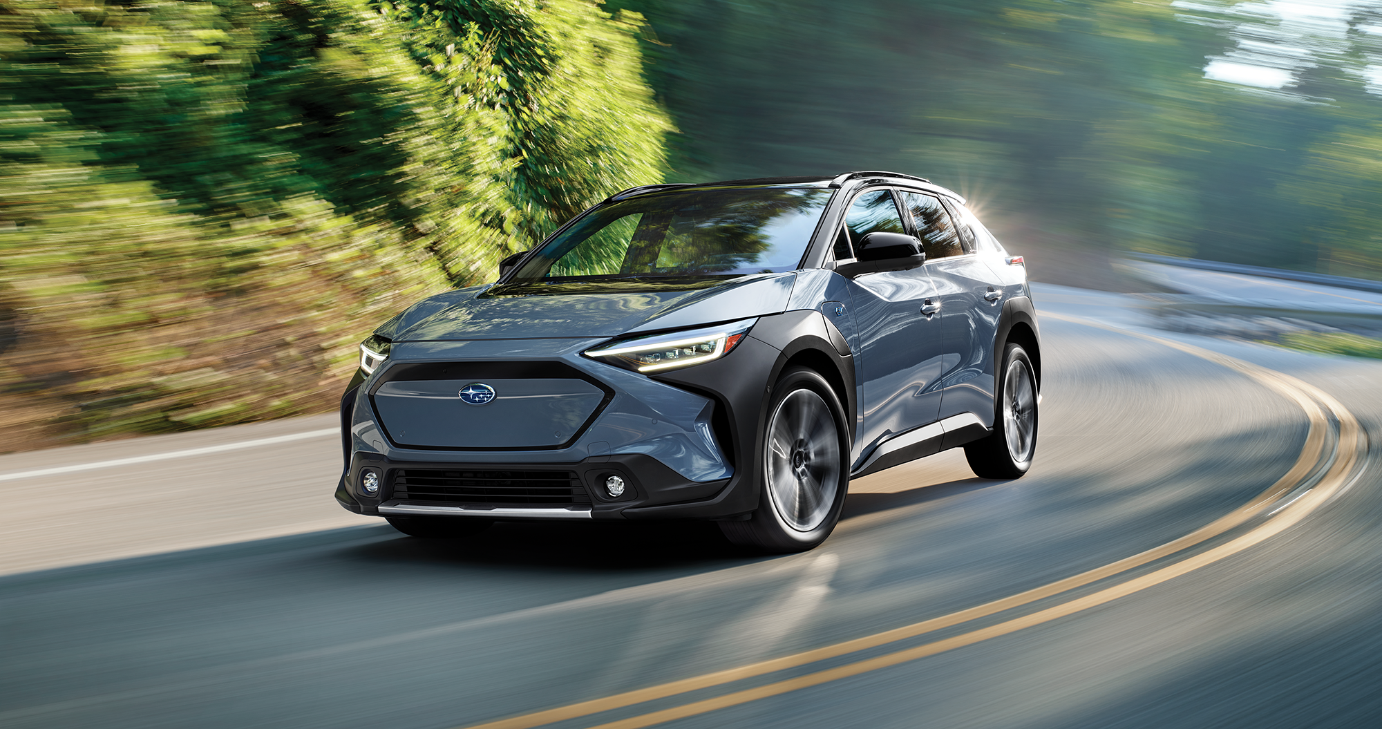 A 2023 Solterra driving on a highway.