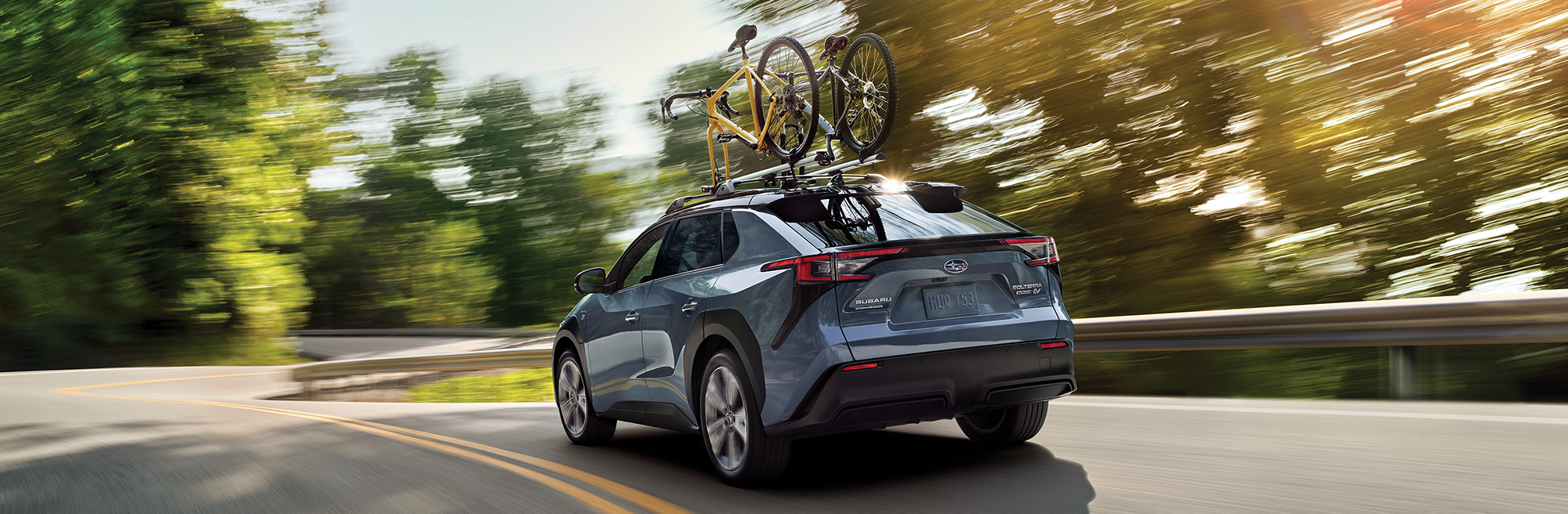 A 2023 Solterra driving on a highway.