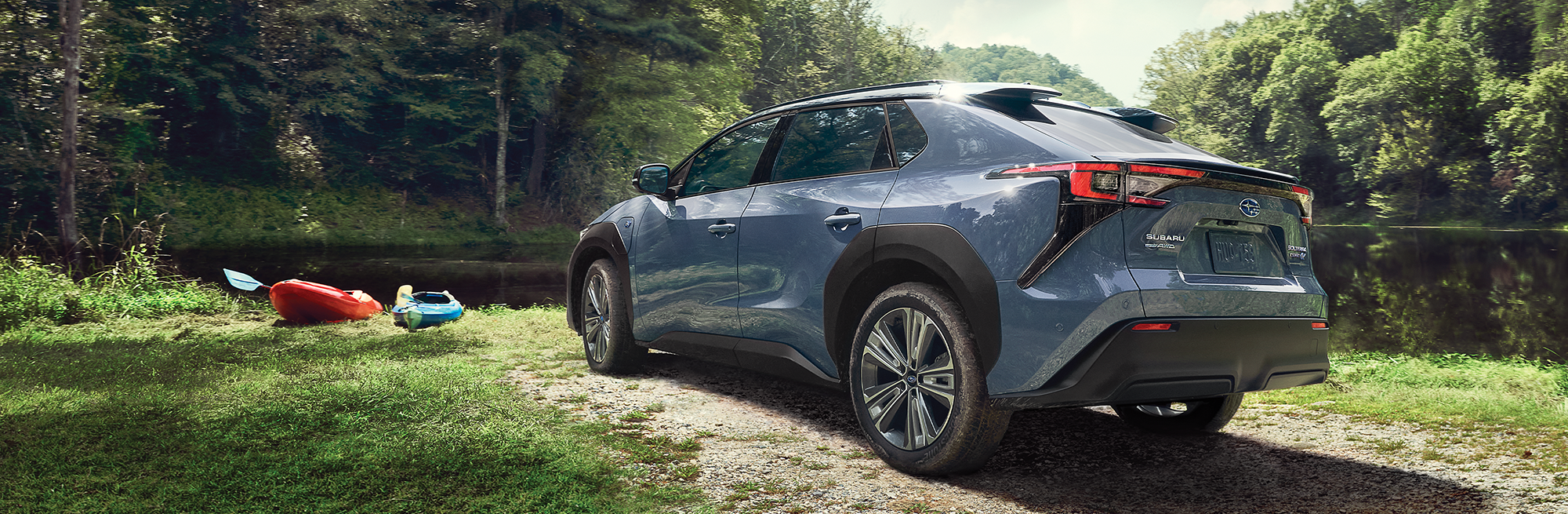 A 2023 Solterra parked at a lake.