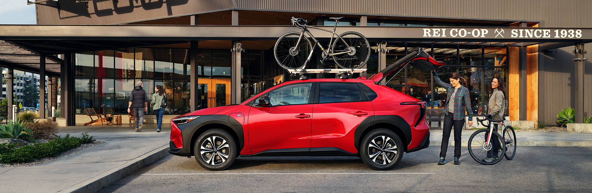 A couple loading bikes into their 2023 Solterra.