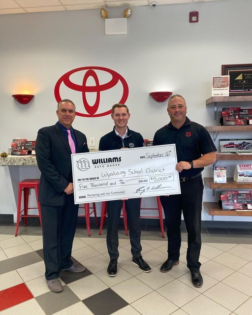 a group of people posing for a picture