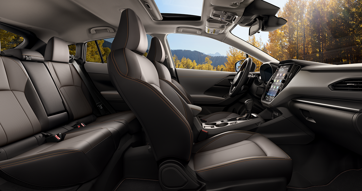 2026 Subaru Crosstrek Limited Hybrid Shown in Gray StarTex® w/Orange Stitch