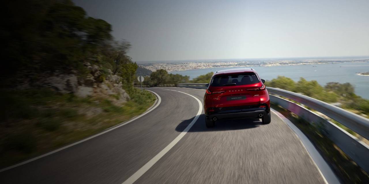 2026 Mazda CX-5 driving on a winding road