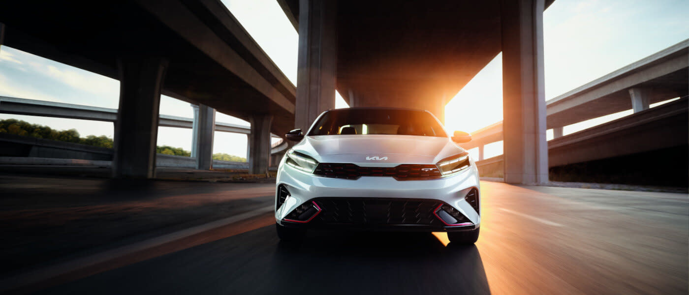 2024 Kia Forte head on at sunrise