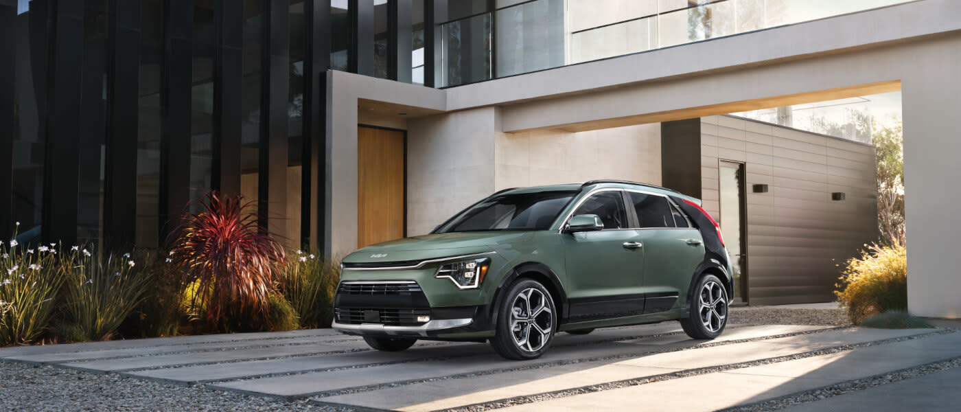 2024 Kia Niro EV parked by a modern building