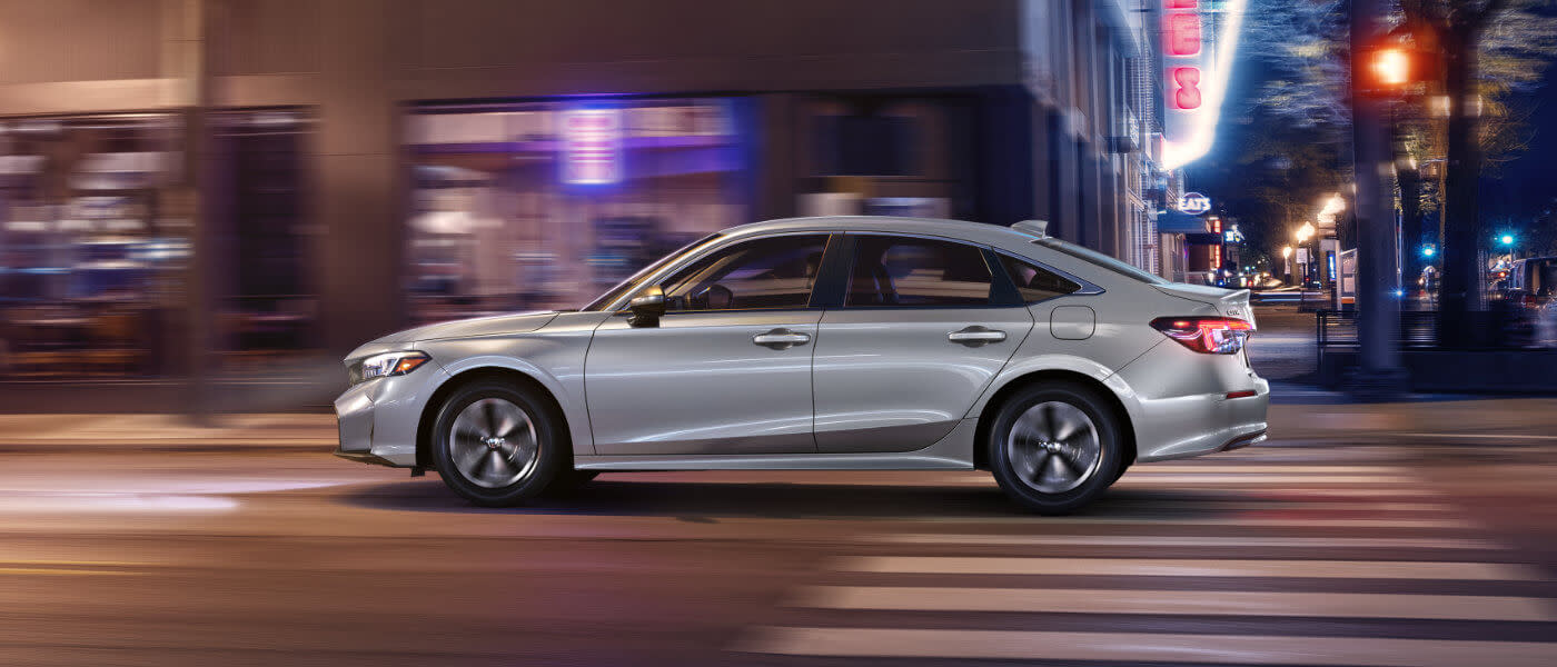 2025 Honda Civic Exterior Driving On City Street At Night