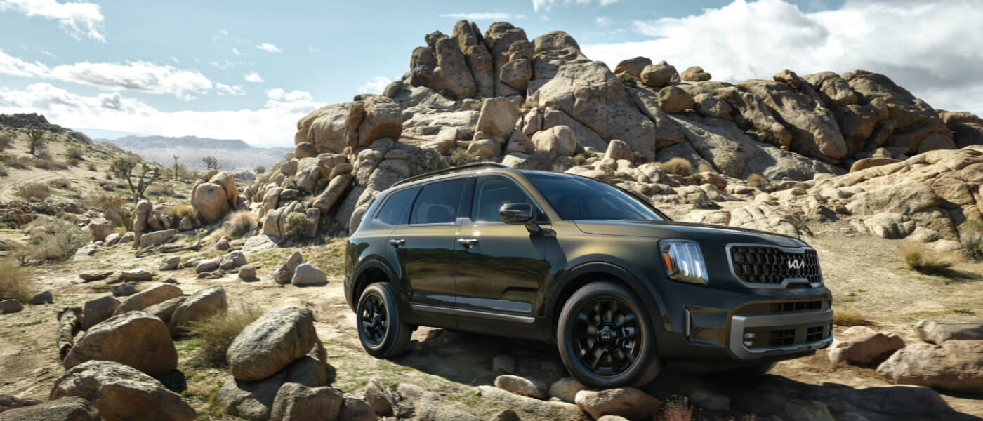2025 Kia Telluride driving over some rocks