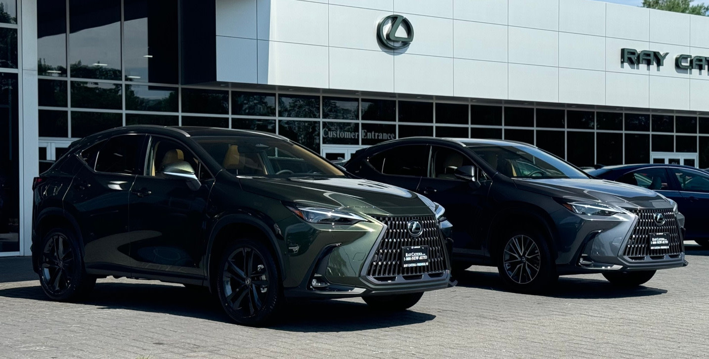 Two Lexus NX SUVs parked in front of New Jersey Lexus dealer, Ray Catena Lexus of Freehold, NJ