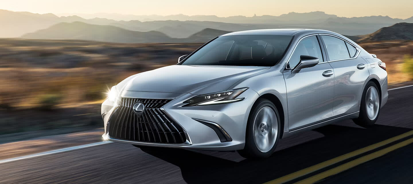 Image of a silver 2025 Lexus ES driving on the highway