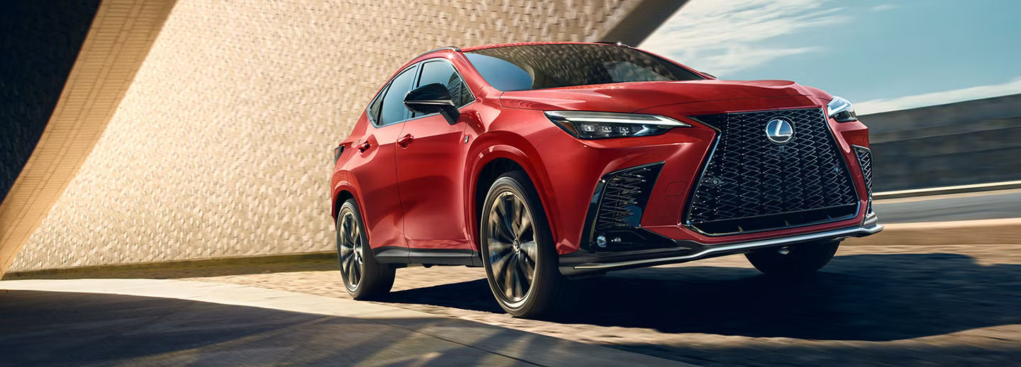 Image of a red 2025 Lexus NX 450h+ plug-in hybrid electric vehicle (PHEV)