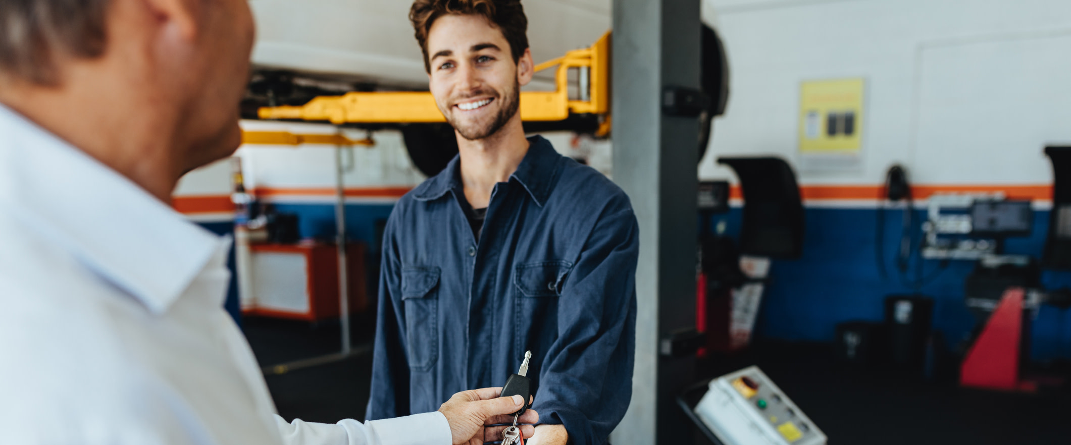 pa technician getting keys from a vehicle owner