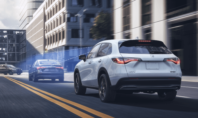 2025 Honda HR-V Exterior Driving In City With Safety Sensors