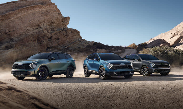 2025 Kia Sportage lineup parked in the desert