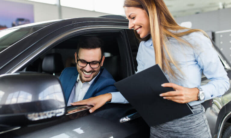 Honda Finance Saleswoman With Customer