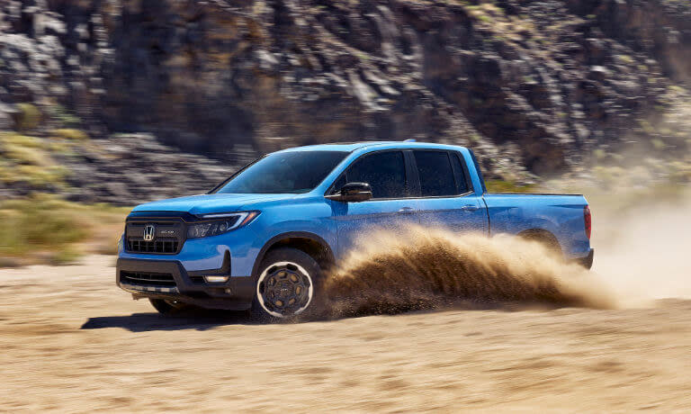 2025 Honda Ridgeline kicking up sand