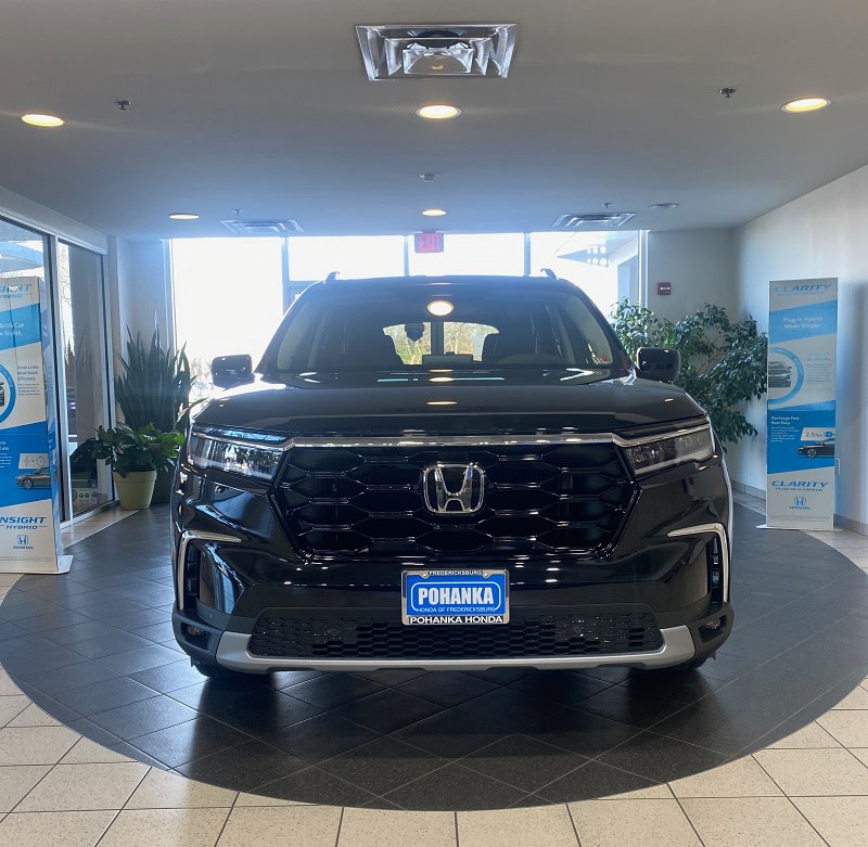 2023 Honda Pilot view of grille and headlights 2023 Honda Pilot view of grille and headlights