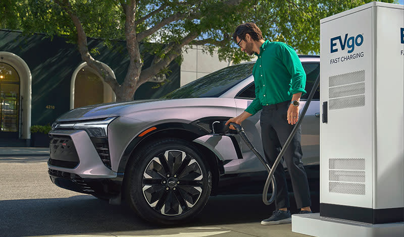 Man charging the 2025 Blazer EV
