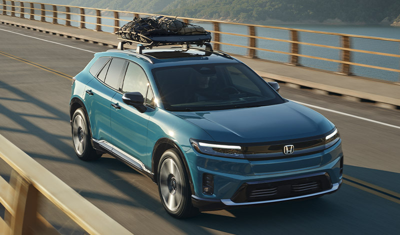 BLue 2025 Honda Prologue driving on road