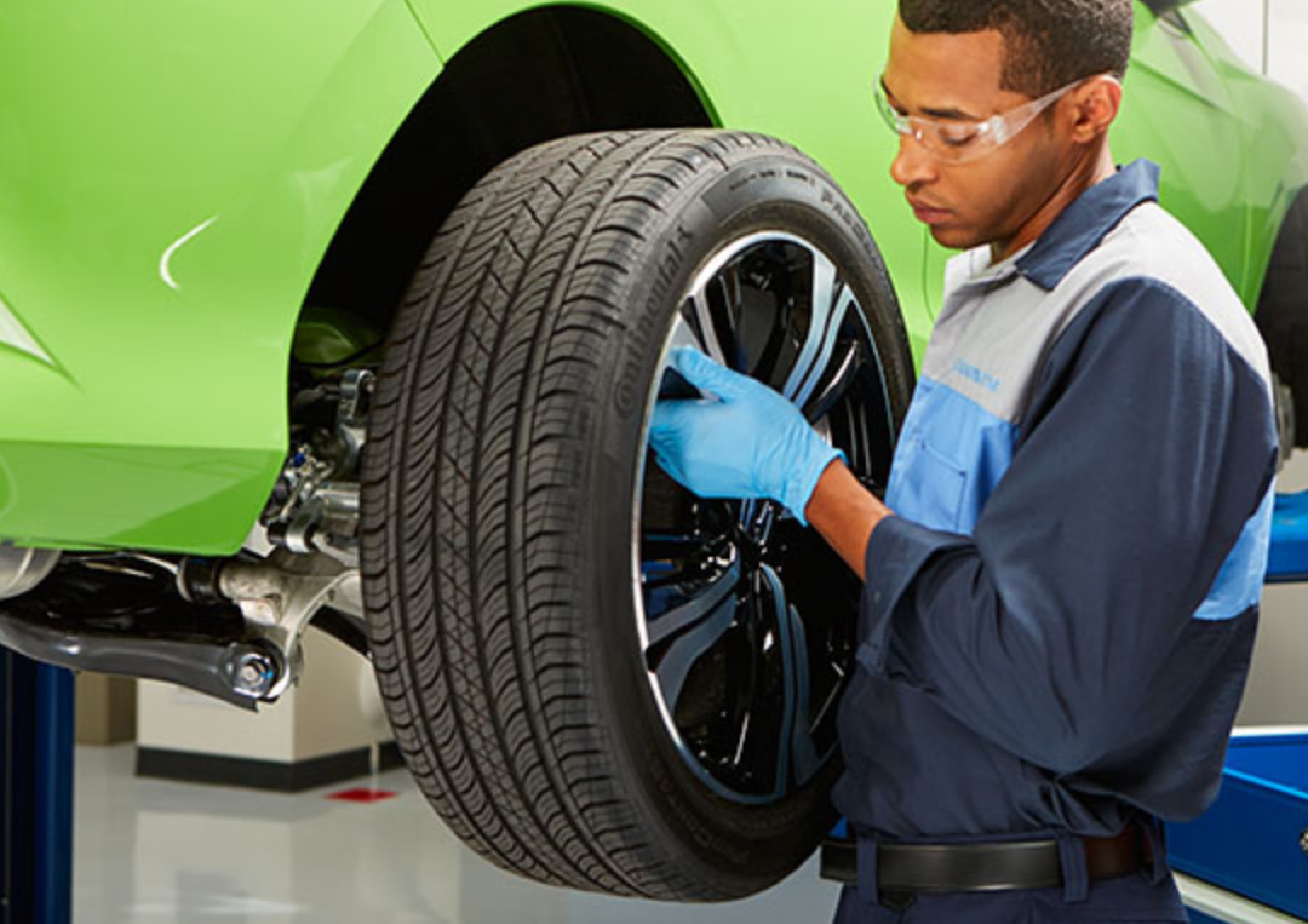 Man replacing tires in Missoula